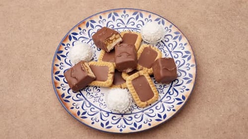 Chocolate Cookies and Candies on a Decorative Plate