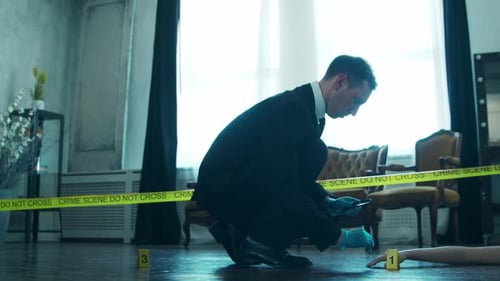 Investigator Taking Photos at Crime Scene