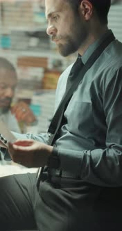 Man, detective and reading folder in office for investigation, forensic report and case evidence