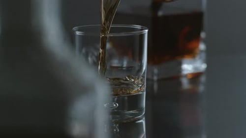 Whisky Is Poured Into Glass in ; on Phantom Flex