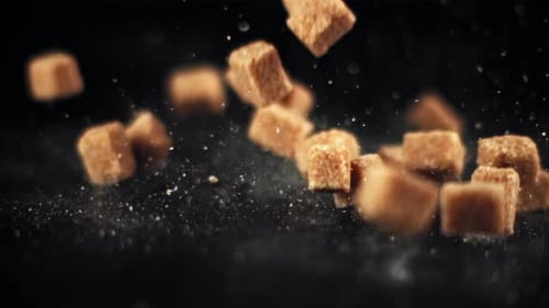Sugar Cubes Falling on a Black Background Filmed on a Highspeed Camera at 1000 Fps