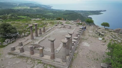 Circular Aerial View of Ancient Assos Temple and Nearby Dramatic Seascape