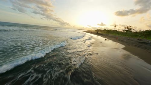 Waves at Sunset on the Beach of Bali