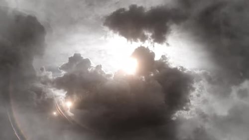 the shining sun was among the thick clouds.