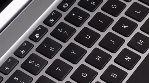 Video Close Up of New Gray Laptop Keyboard and Screen Close Up Camera Slide on Laptop Black Keyboard