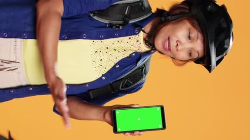 Courier Holding Chroma Key Smartphone