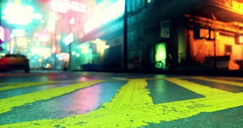 Vibrant City Street at Night with Colorful Lights and Wet Pavement