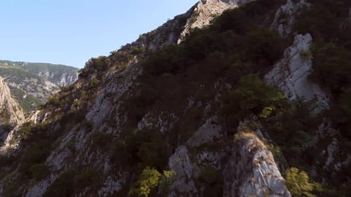 aerial view of mountains. drone is passing close to mountains. rocky mountains.