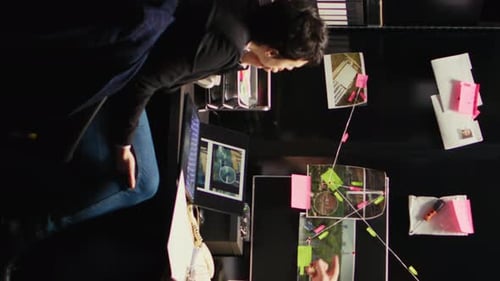 Detectives Collaborating on Case in Office