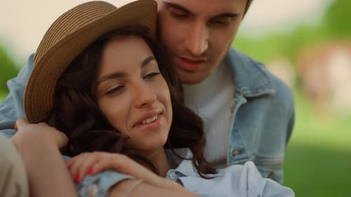 Relaxed Couple Picnic in Summer Park