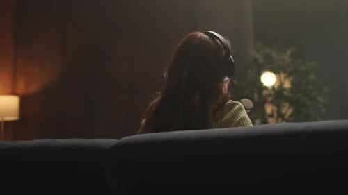 Woman Recording Podcast with Tablet and Microphone