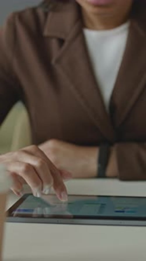 Businesswoman Works with Tablet in the Office