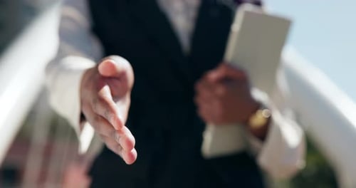 Business person, handshake and tablet with deal for agreement, introduction or greeting in city