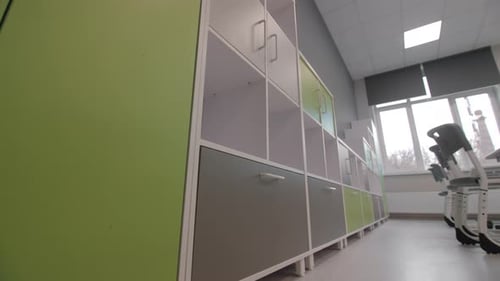 Modern Classroom with Colorful Lockers and Desks