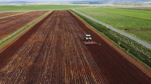 Tractor Cultivating process aerial view