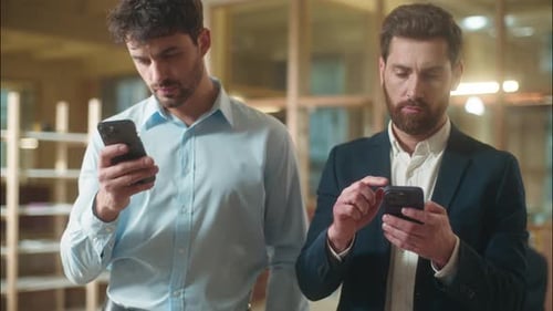 Business Men Caucasian Businessmen Coworkers Using Mobile Phones in Office Addiction Gadgets Two