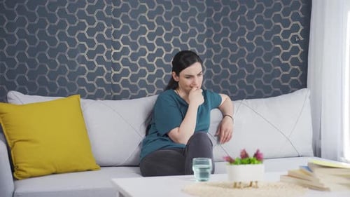 The woman is frustrated. Annoyed.