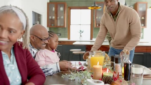 Multigenerational Family Gathering Around Dining Table