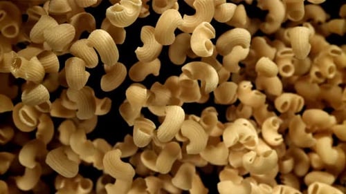 The Dry Pasta Flies Up and Falls Down Filmed on a Highspeed Camera at 1000 Fps