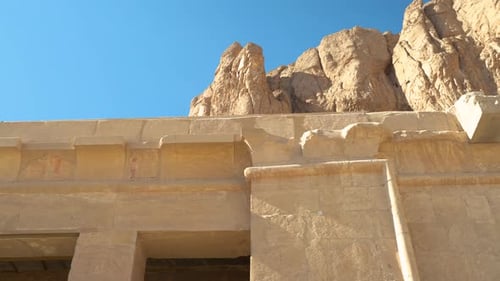 A Huge High Mountain Near an Egyptian Temple