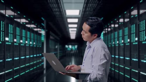 Asia Male Worker Use Laptop And Feels Dissapionted in Data Center