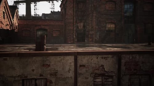 Abandoned Factory Complex with Collapsing Brick Structures at Dusk