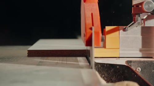 Closeup of Carpenter Cutting a Wooden Plank Circular Saw on Wooden Factory Furniture Production