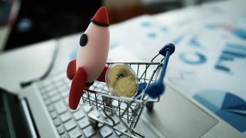 Rising Bitcoin: Rocket and Cryptocurrency Shopping Cart Concept