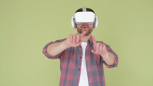 Man Using Virtual Reality Headset Interacting with Technology