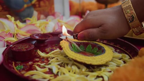 Lighting Decorative Diya at Diwali Celebration