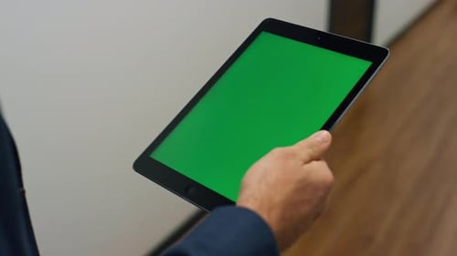 Businessman Hands Hold Tablet with Chroma Key Screen Closeup