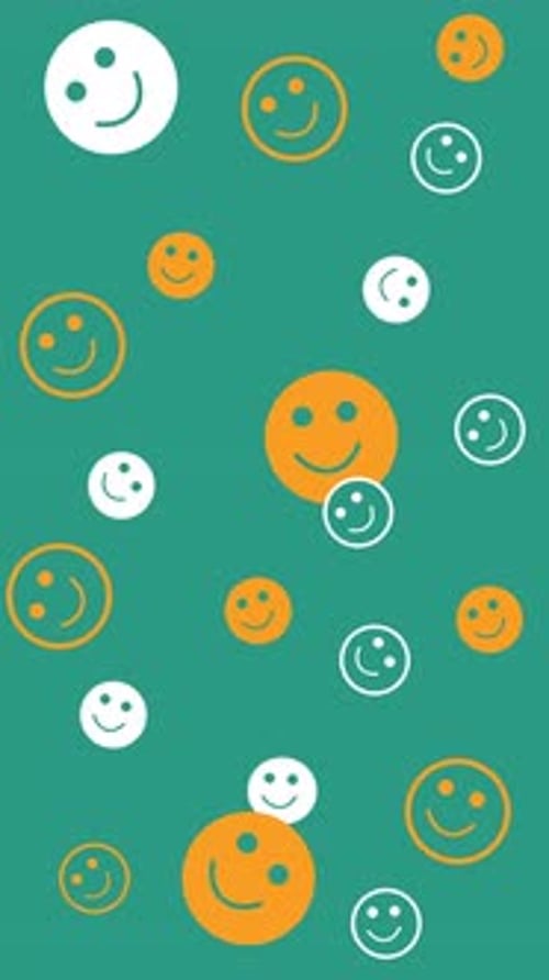 Seamless Loop Animation of Orange and White Smiley Faces Rotating Randomly on Green Background