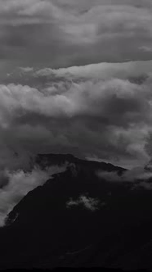 Mountains Shrouded in Clouds in Black and White