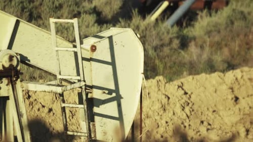 Oil Pumpjack Arm and Counterweight Mechanism Close-Up