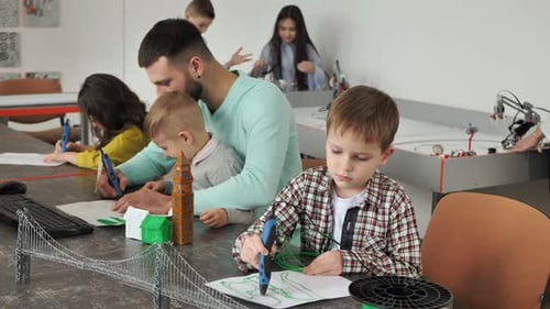 Child Using 3D Printing Pen