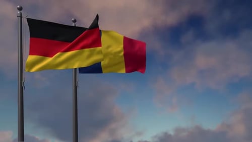 Germany and Romania National Flags Waving in Wind