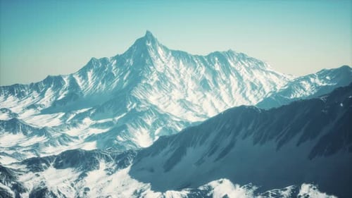 Cinematic Aerial View of Snow-Capped Mountains Landscape