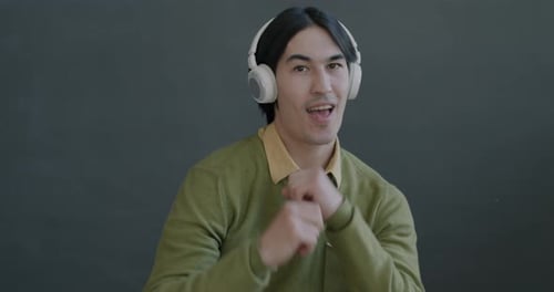 Man Dancing with Headphones On