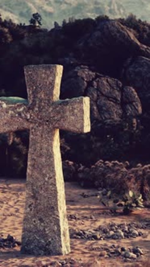 A Solitary Cross Standing in the Vastness of a Desert Landscape