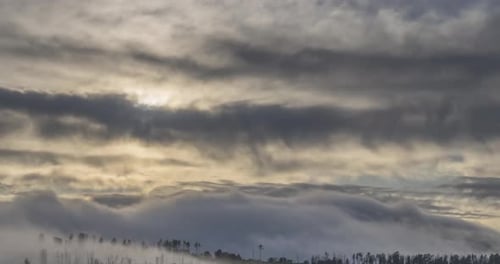 Dreamy Golden Sunrise Over Misty Mountains