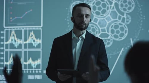 Man Presenting Data at Corporate Meeting