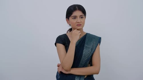 Woman Expressing Thought and Consternation Indoors