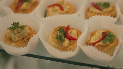 Close-up of small appetizers with Christmas decorations. 4k.