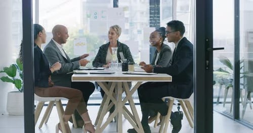 4k video footage of a group of businesspeople having a meeting in an office