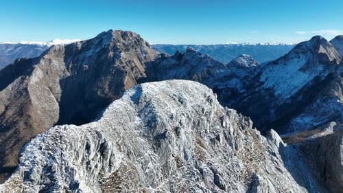 Aerial view of mountains with snow peaks, Italy.