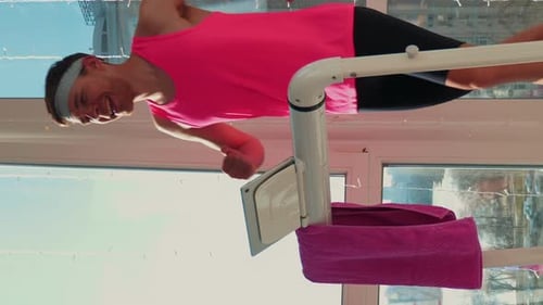 Man Running on Treadmill During a Workout