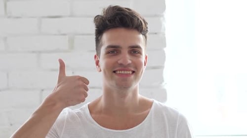 Young Adult Gives Thumbs Up of Approval