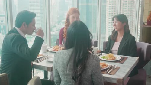 Business People Having Lunch Meeting in City