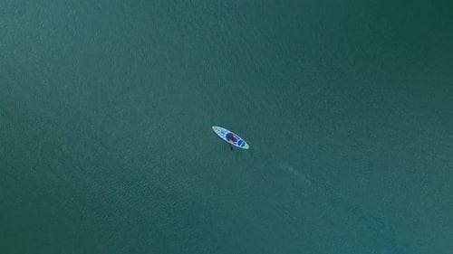 Aerial View Adventure on Paddleboards Through Mysterious and Unexplored Waters
