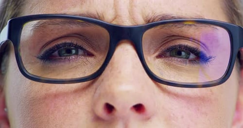 Close Up Of Woman With Glasses Looking